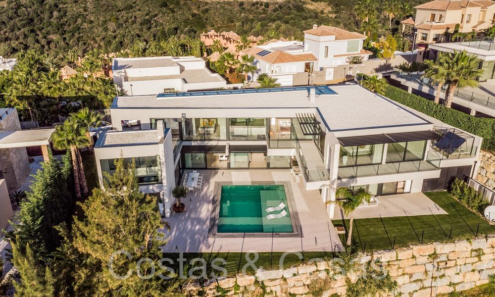 Villa de luxe supérieure à vendre, en première ligne de golf avec vue panoramique sur les montagnes, le golf et la mer à Benahavis - Marbella 69306