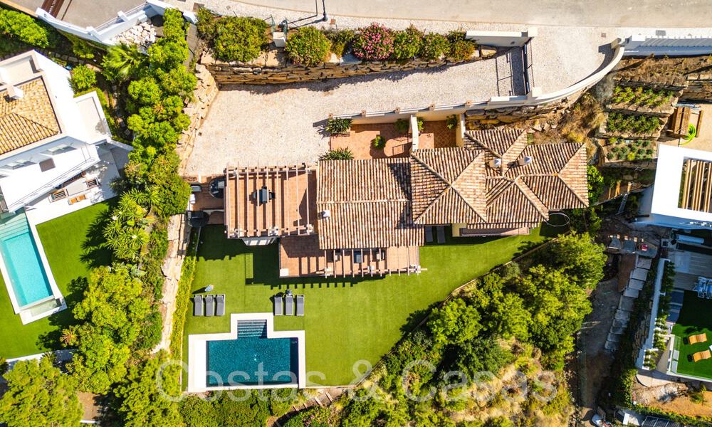 Villa de luxe espagnole intemporelle avec vue panoramique sur la mer à vendre dans une urbanisation sécurisée de Marbella - Benahavis 71569