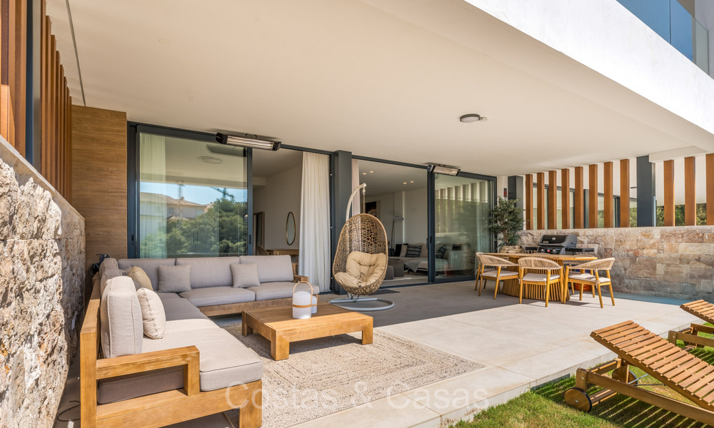 Appartement de jardin moderne et élégant prêt à emménager avec jardin privé et vue sur la mer à vendre à l'Est de Marbella 72735