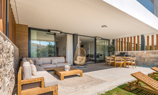 Appartement de jardin moderne et élégant prêt à emménager avec jardin privé et vue sur la mer à vendre à l'Est de Marbella 72735 