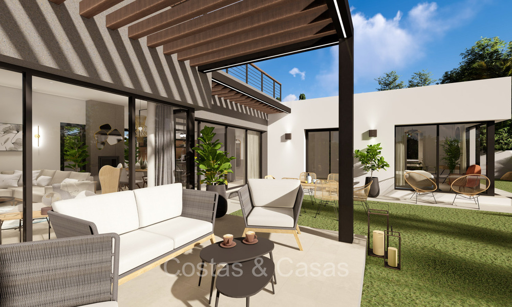 Villa moderniste de nouvelle construction à vendre dans une zone de golf près du centre d'Estepona 74194